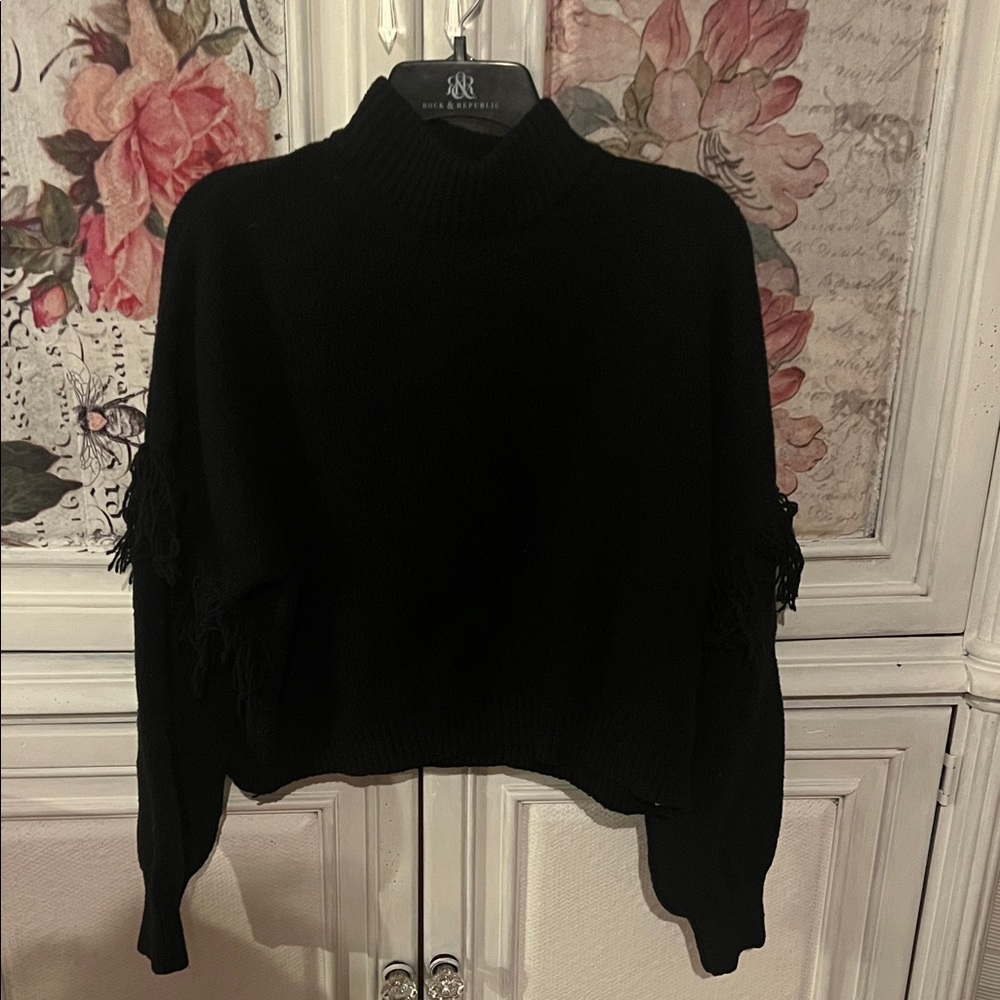 Elegant Black Turtleneck Sweater with Fringe